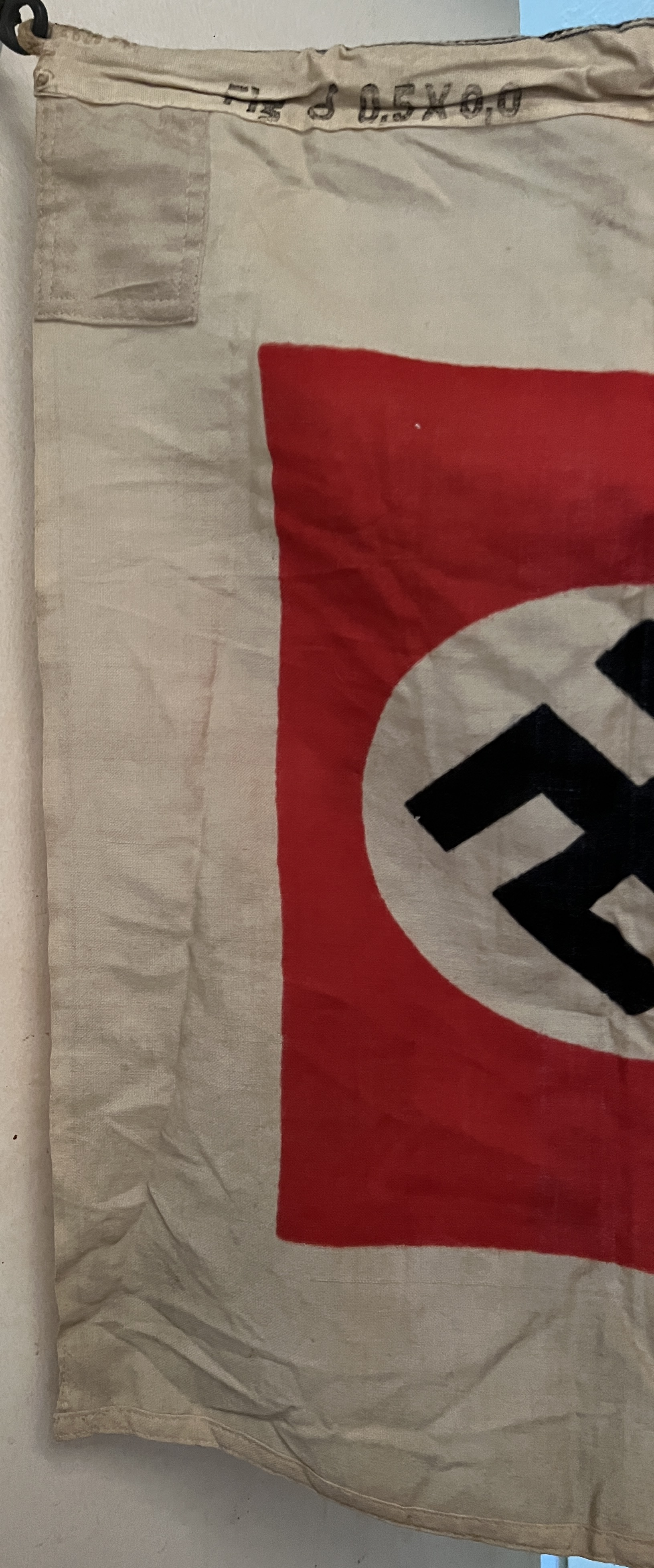 black swastika with red and white background